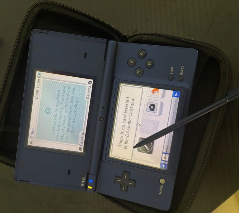 Blue Nintendo Dsi with case 