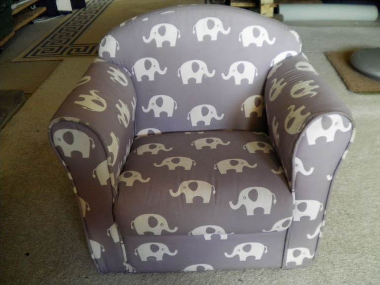 Child’s arm chair, good condition located near Norwich