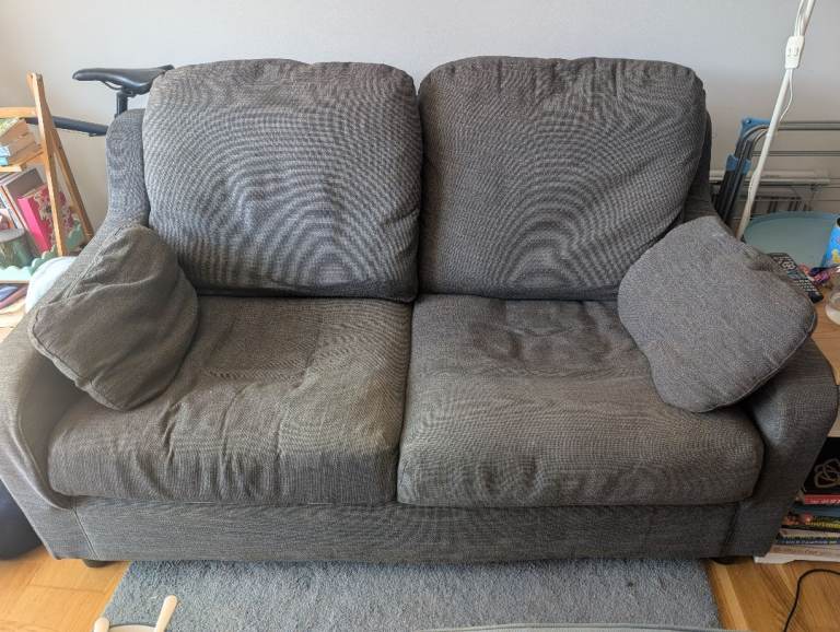 Grey Two-Seater Sofa with Cushions – Good Condition