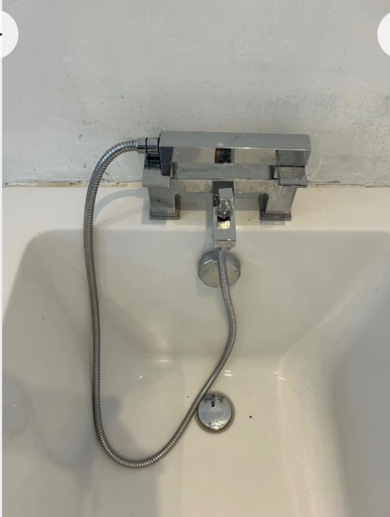 Bath and mixer tap with shower attachment