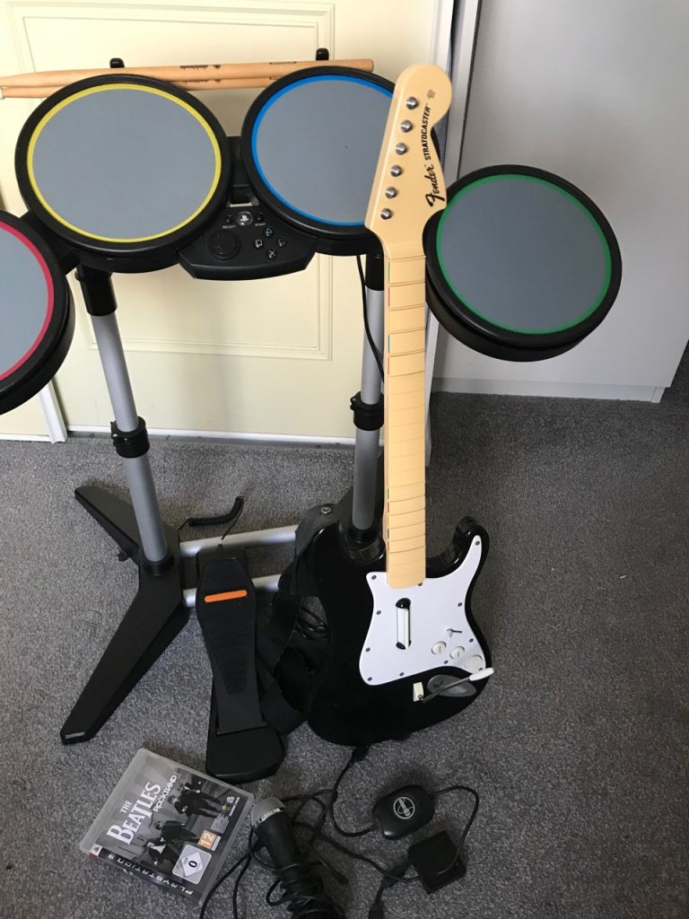 PlayStation rockband. drum set with fender guitar 