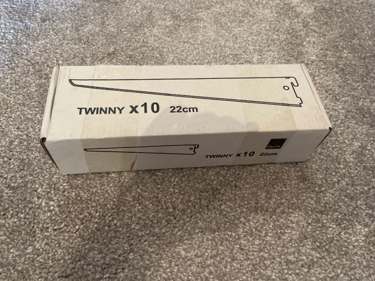 Brand new box of 10 white 22cm Twinny shelf brackets 