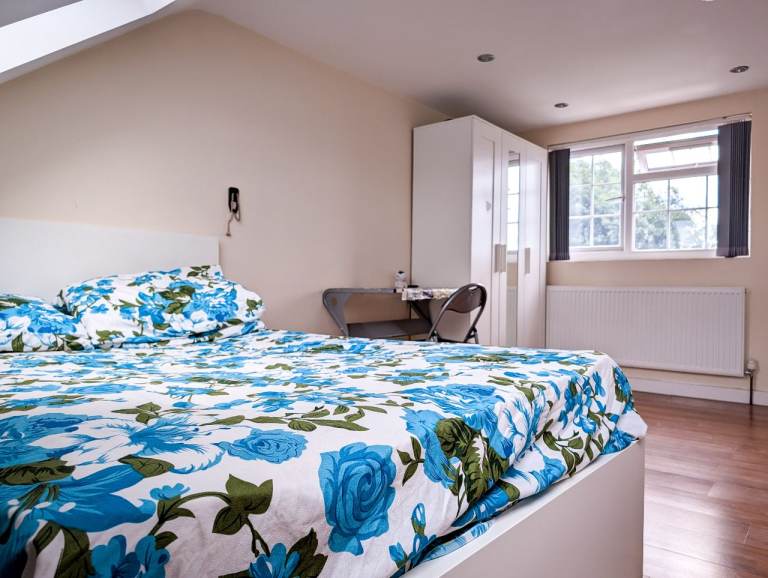 Double loft room available to rent in a family home.