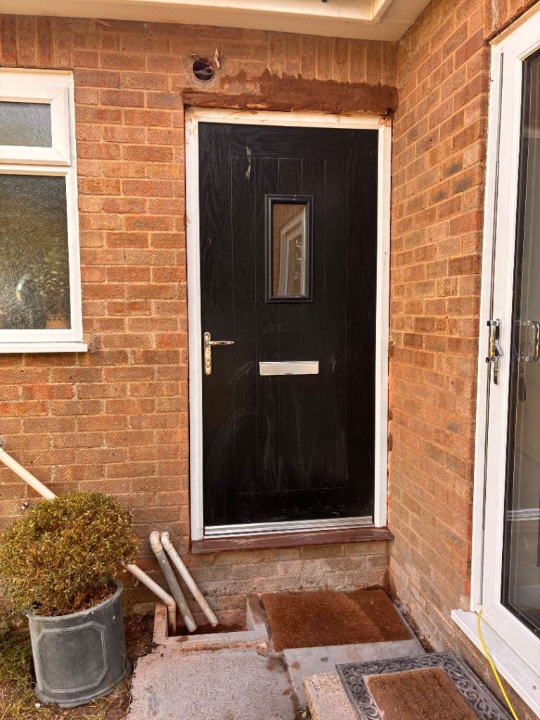 Black compersit External Door with Frame – Good Condition