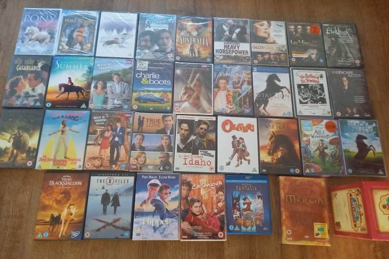 job lot of dvds. all sealed/ sellable conditon. movies/ films/ t.v series/ box sets
