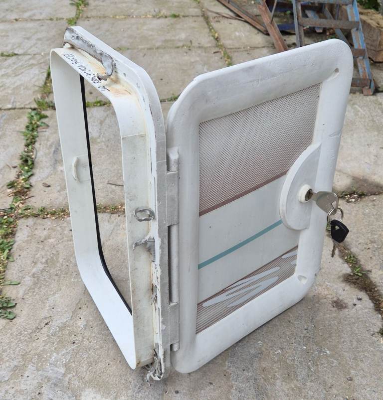 Various side doors with frames and keys for caravan camper motorhome - gas, toilet, storage.