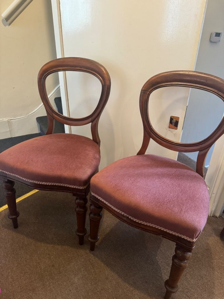 Two Antique Wooden Chairs with Burgundy Velvet Upholstery