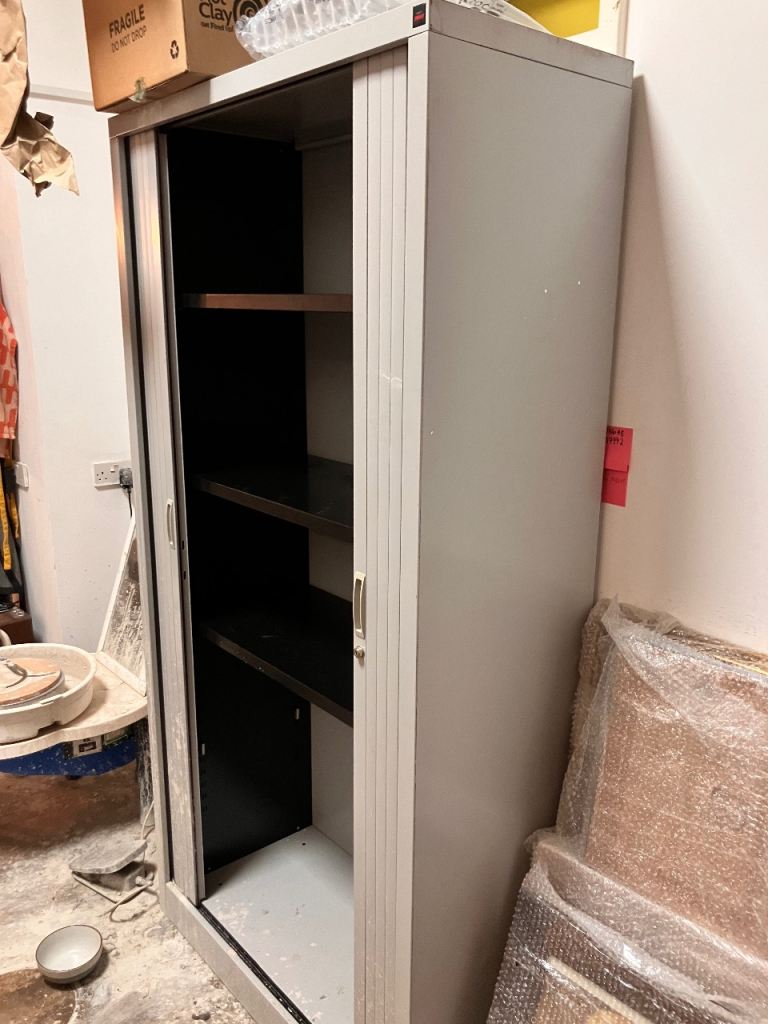 Free roller door storage cabinet 