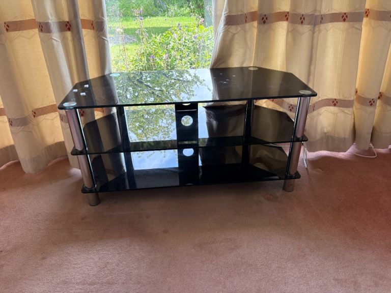 Free black glass tv stand 