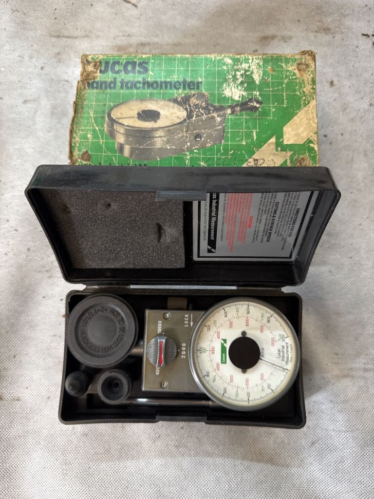 Lucas Hand Tachometer in Original Case – Good Condition