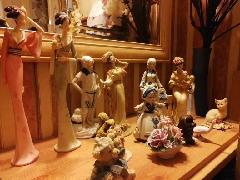 Old-style antique porcelain figurines