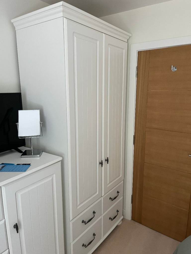 White Wooden Wardrobe with Two Doors and Four Drawers