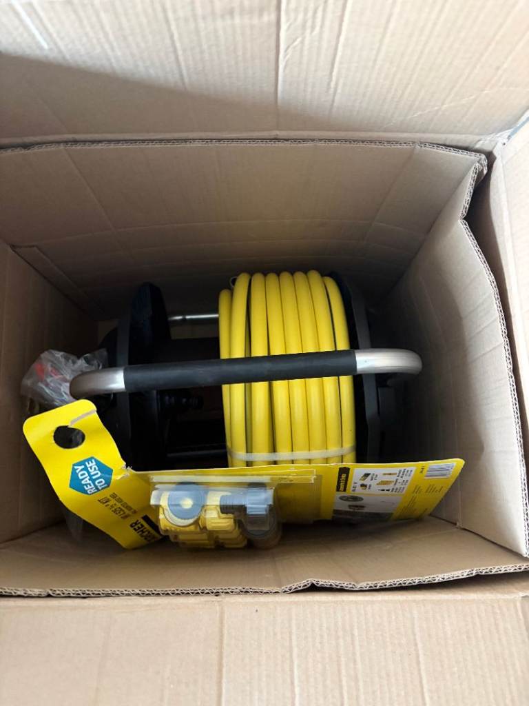 Brand new Karcher hose reel kit, still in its original packaging. with a 30m hose and connectors
