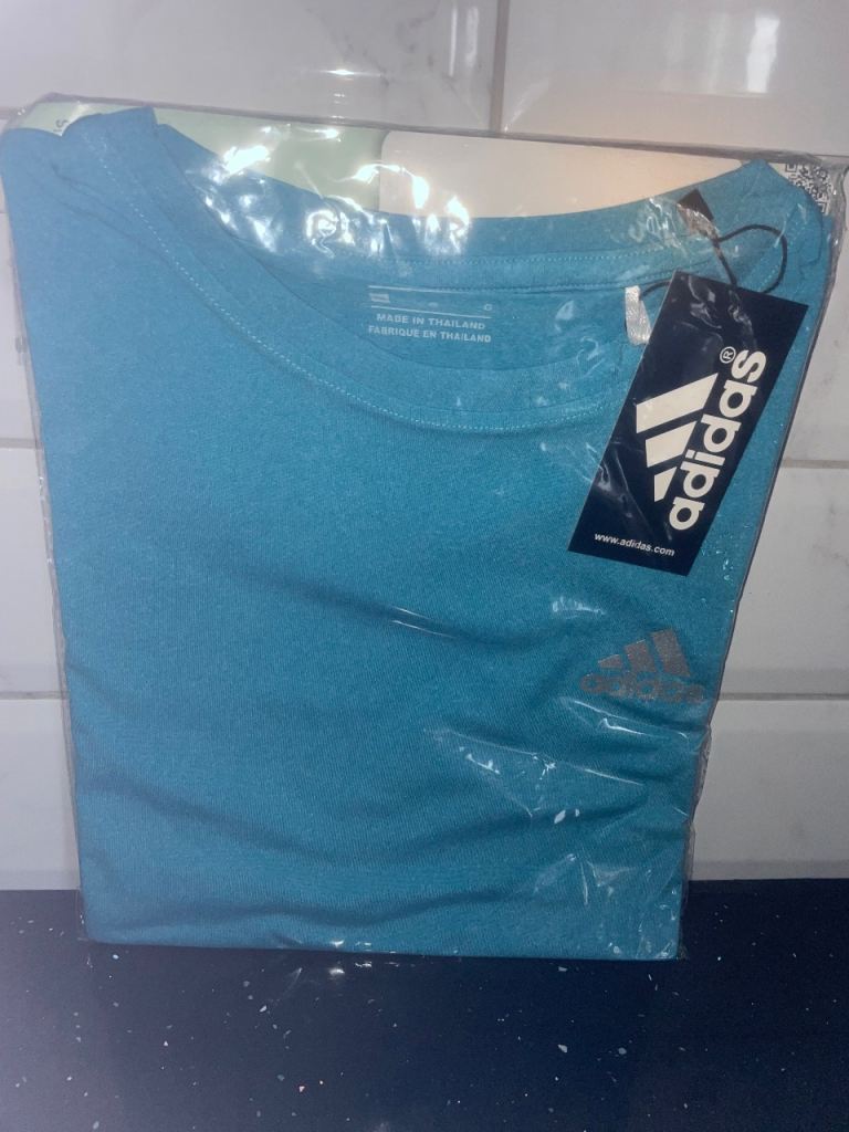 image for Adidas X Nike T Shirts 