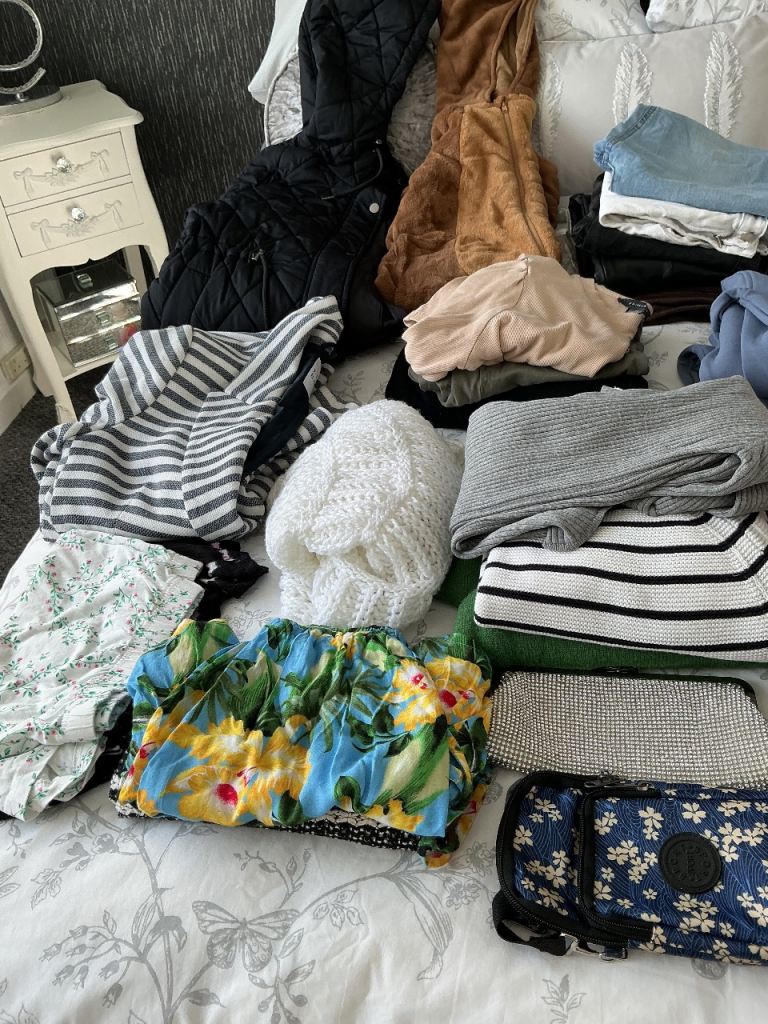 Large Bundle of Women's Clothes  mixed sizes.