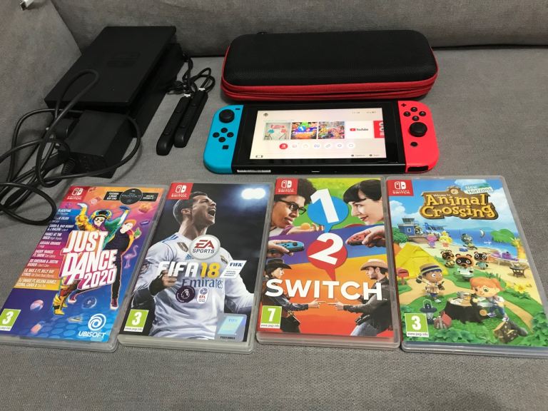 Nintendo Switch Neon Red 32gb Console Bundle with 4 games 