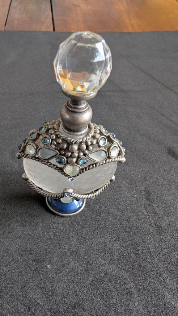 Decorative glass and pewter perfume bottle