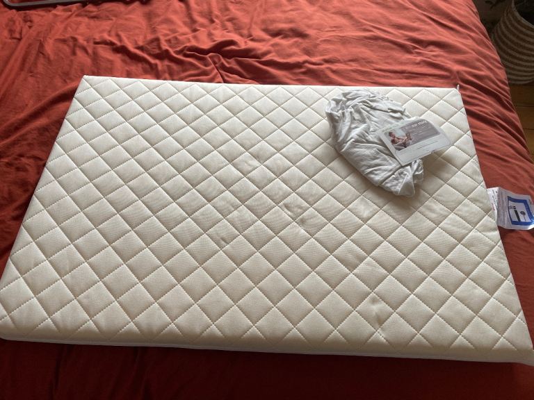 Brand new, cot mattress and sheet 