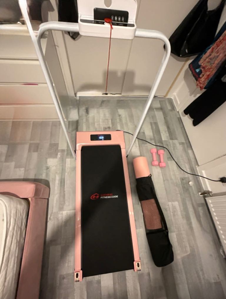 All pink, treadmill, yoga mat and dumbbells 