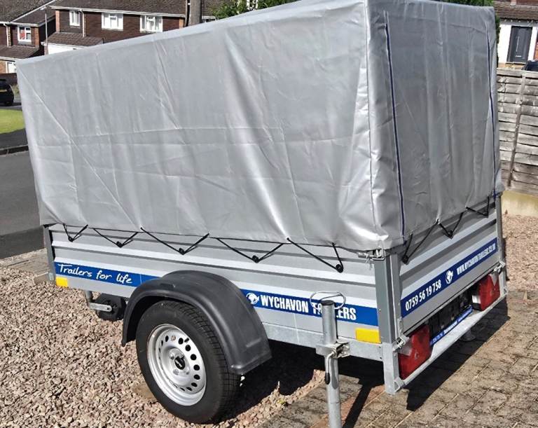 Caged trailer with cover
