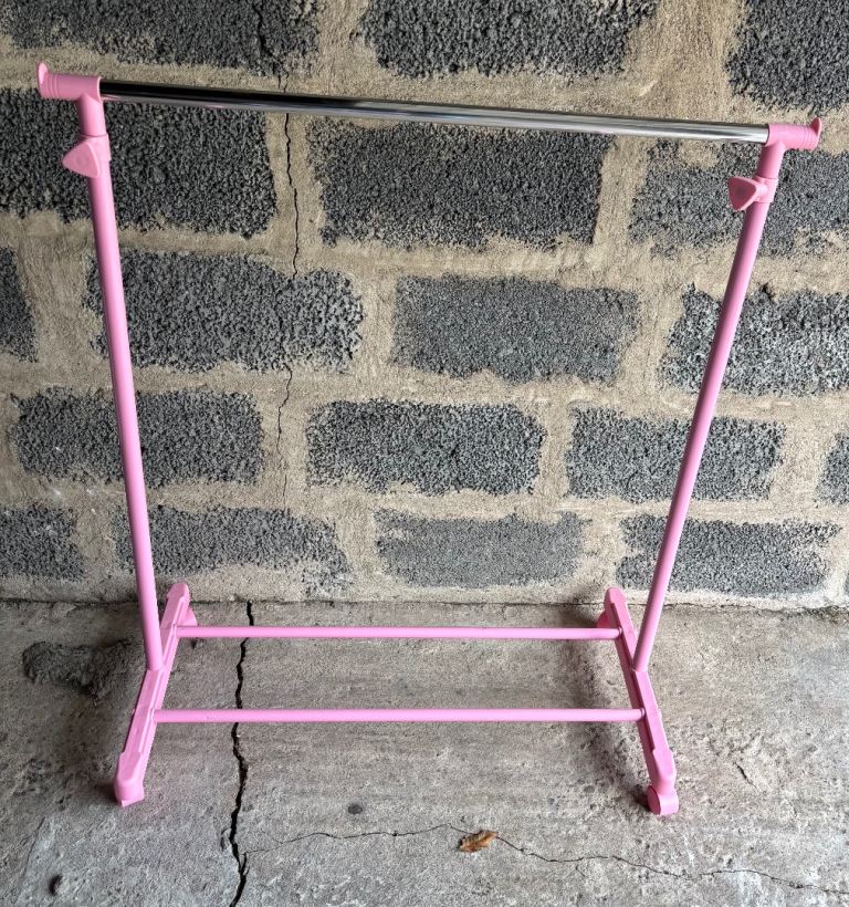 Adjustable Pink Clothes Rail on wheels 