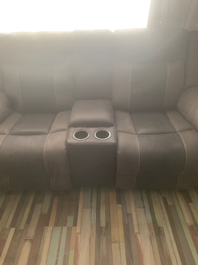 Dark and light grey leather recliners