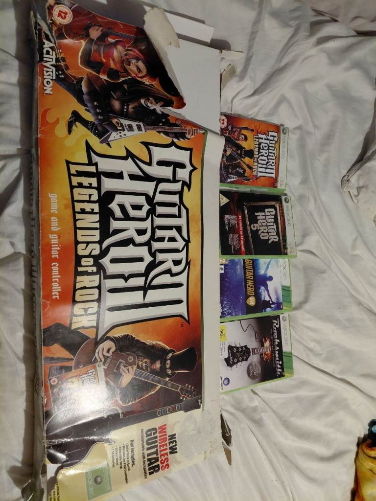 Guitar Hero wireless controller with Guitar Hero games
