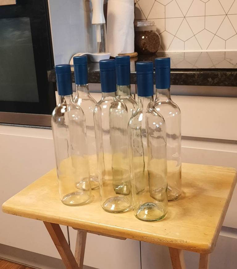 6 Clear Glass wine Bottles