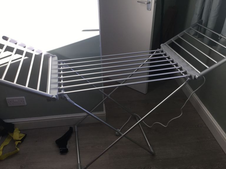 Heated clothes dryer