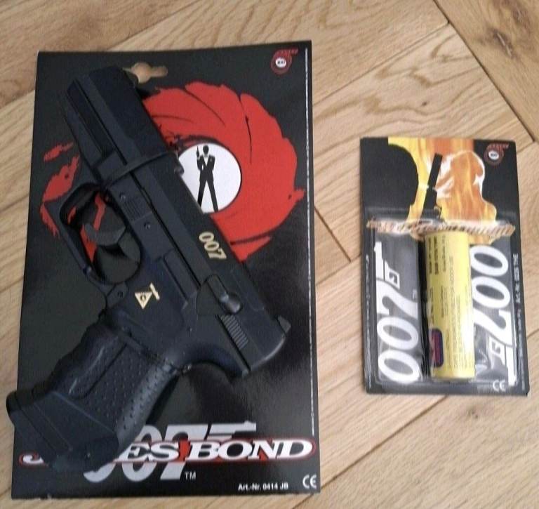 James Bond p99 ppk toy cap gun pistol with 1200 007 wicke paper caps new will post very rare 