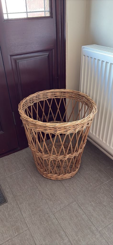 vintage open-weave wicker basket featuring a distinctive "fitched" weave pattern