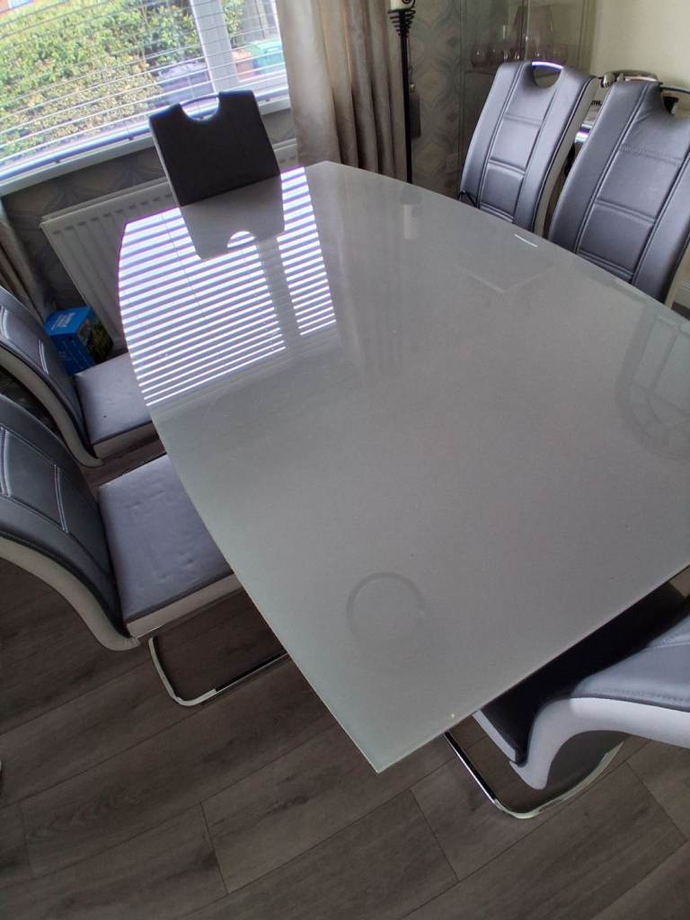 Dining table and 6 chairs
