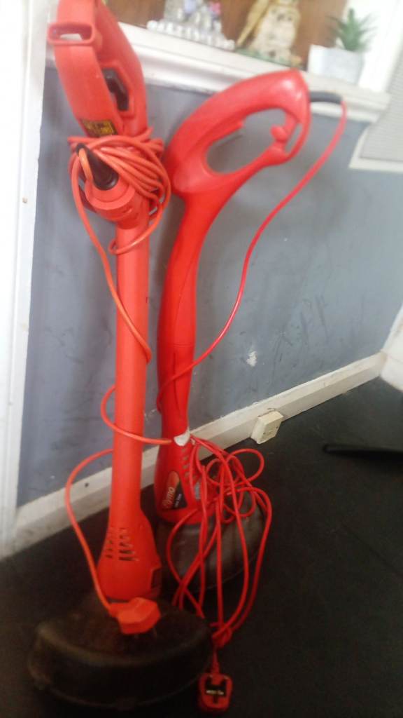Red Electric Garden Trimmer – Used Condition