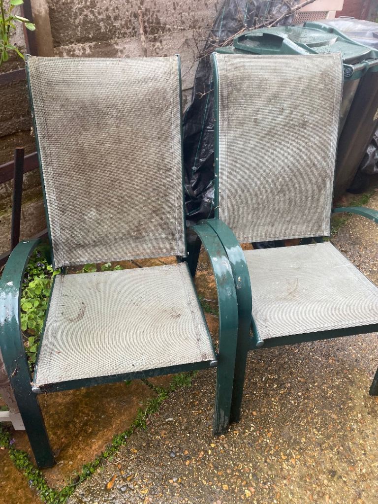 Two green garden recliner chairs 