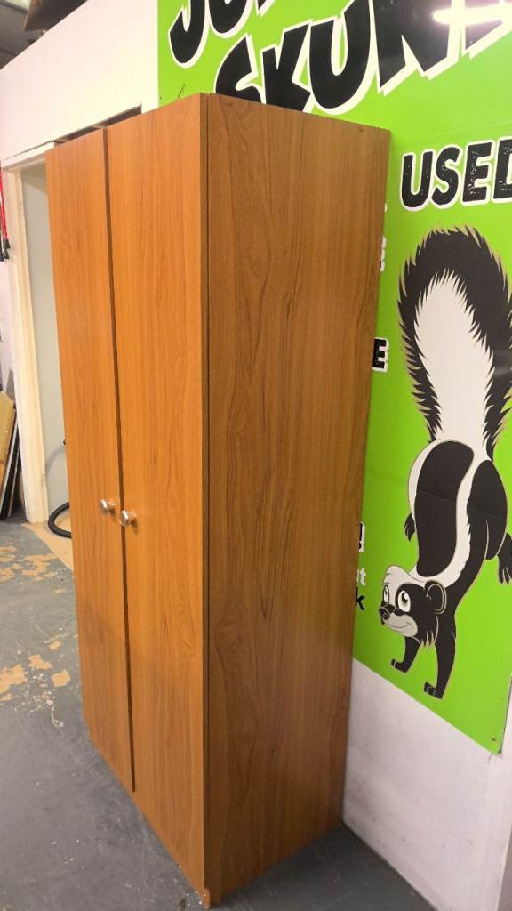 vintage single wardrobe with a rail and adjustable shelves