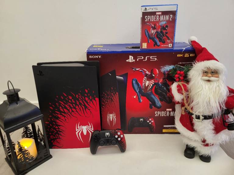 image for Ps5 disc spiderman with controller 