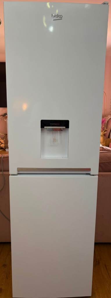 Beko 50/50 white fridge freezer only 1 year old .