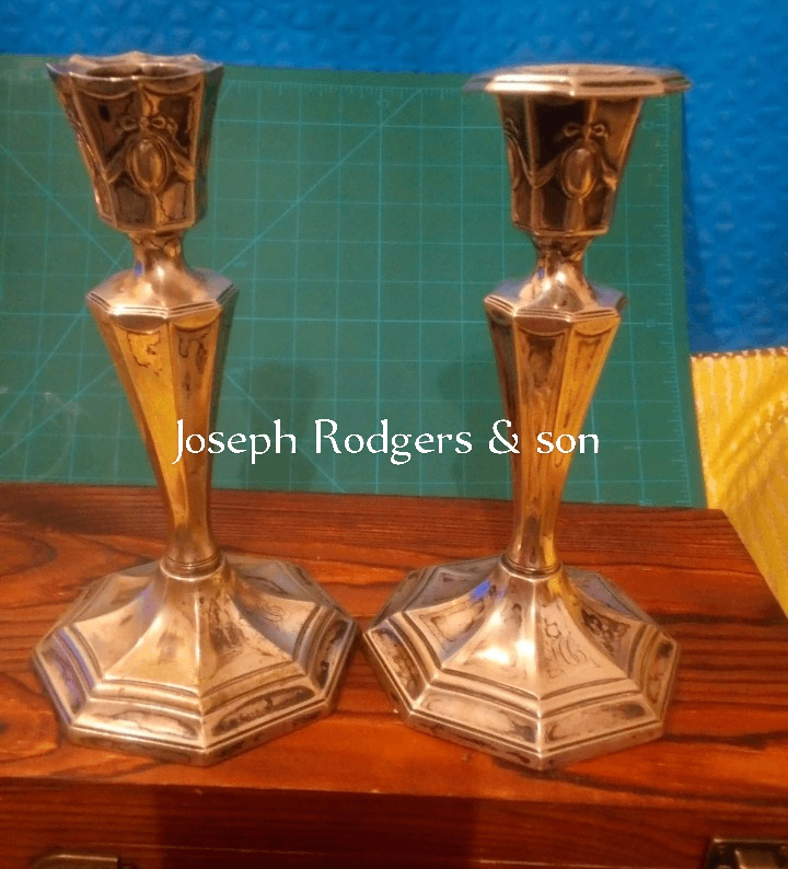 Pair of Joseph Rodgers & Son Silver Candle Holders