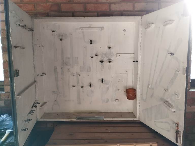 Wall mounted tool cabinet