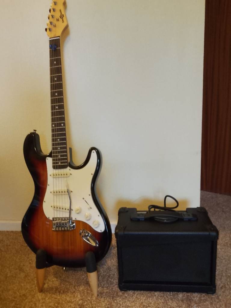 Strat guitar, amplifier, gig bag.