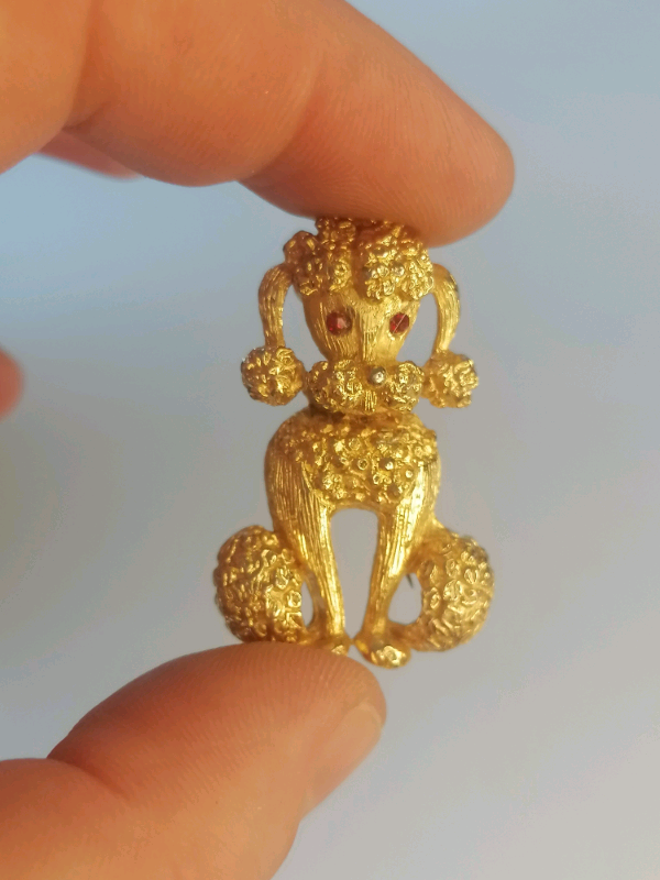 Vintage very nice brooch poodle with red eyes. 