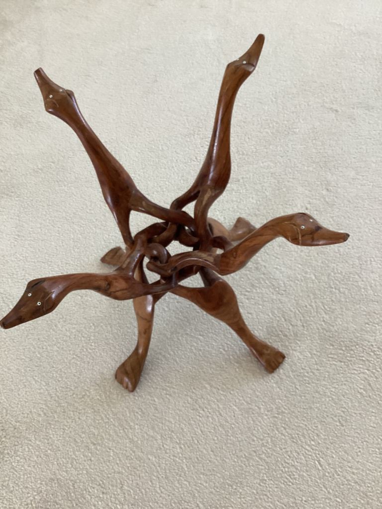 An Interlocking & Collapsible Carved Teak Snake Heads Ornament 