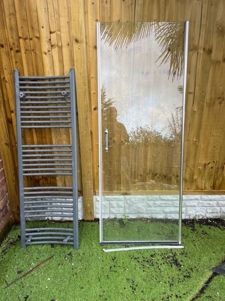 Shower door and bathroom radiator 