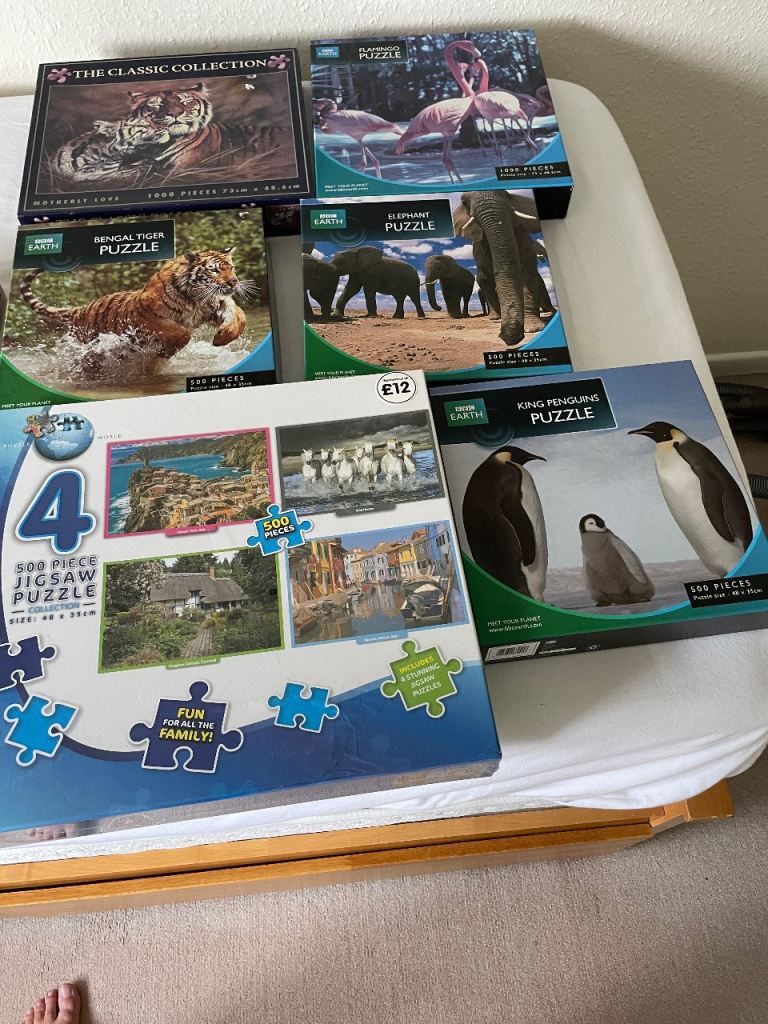 13 assorted jigsaw puzzles 