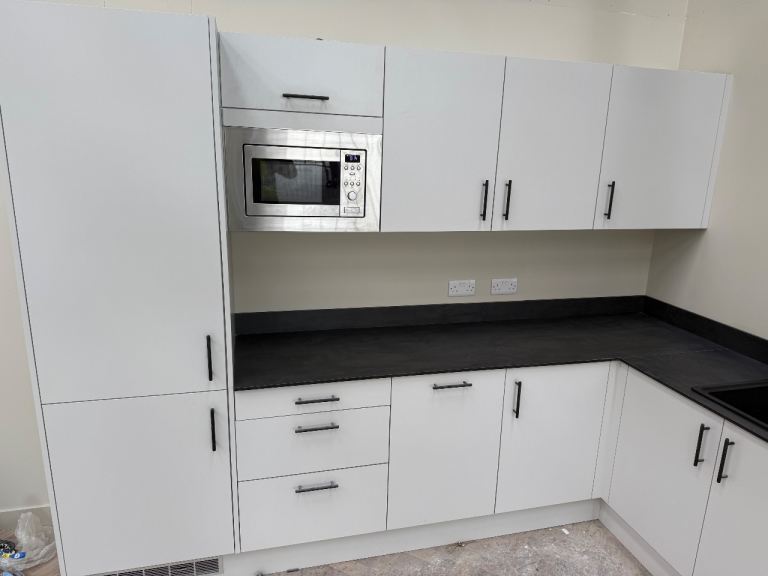 Modern light grey Kitchen with compact laminate worktop and appliances – ex display 2yr old