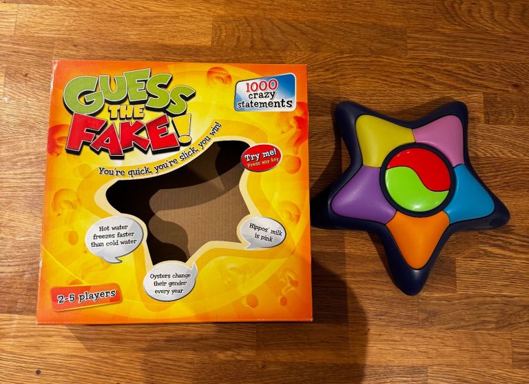 Guess The Fake! Board Game – As Good As New