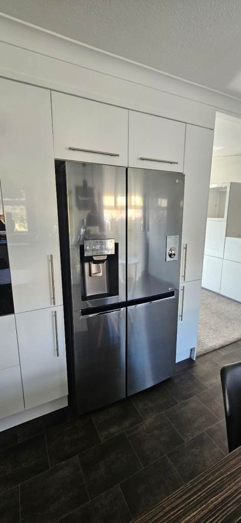 LG silver coloured large American Fridge 