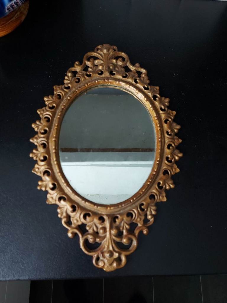 Vintage metal framed mirror