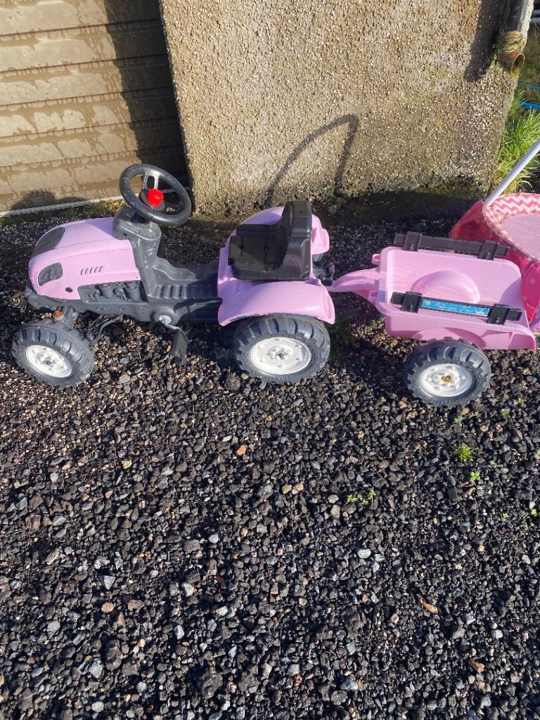 Small pink tractor and trailer 