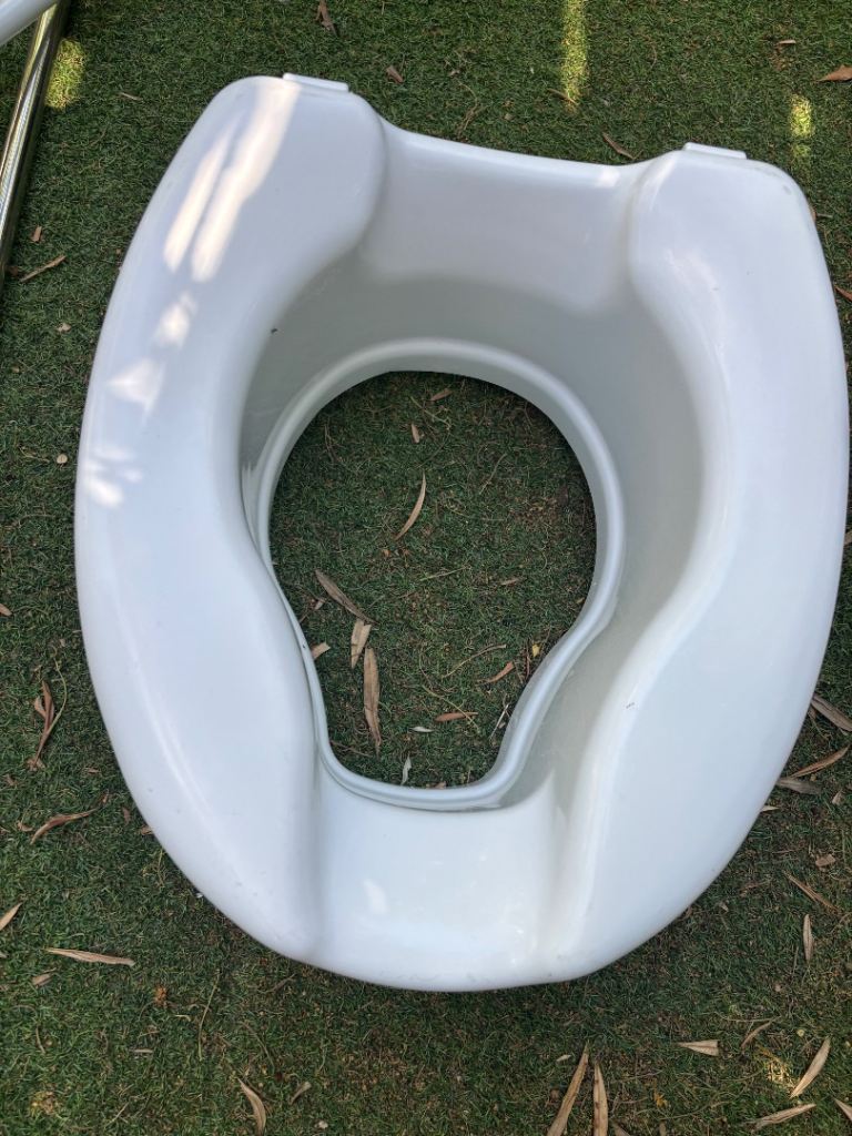 White Plastic Raised Toilet Seat